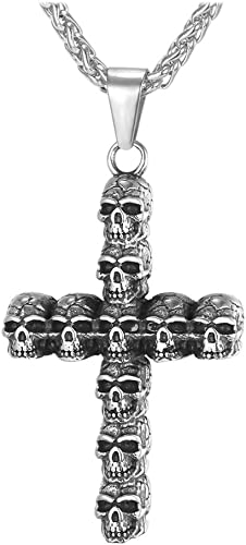 skulls stacked to form a cross pendant